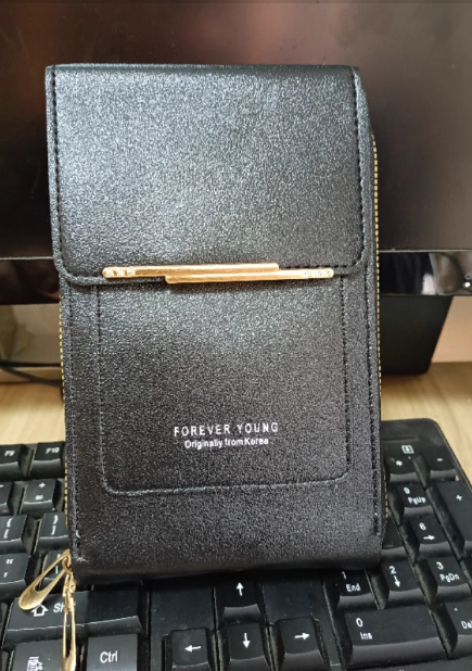 Crossbody taske med RFID-beskyttelse og lynlåslommer