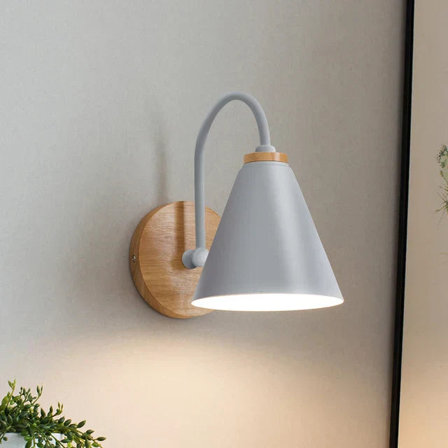 Luminous Oak: Modern Wooden Wall Lamp with Cone Shade in Stylish Scandinavian Design