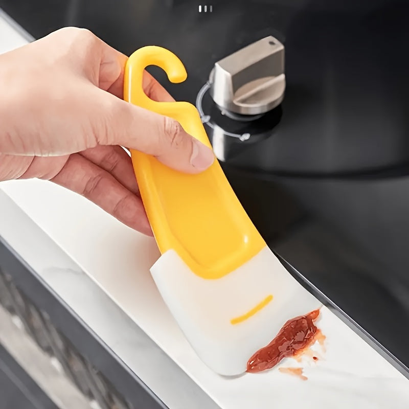 Køkkenskrapeværktøj med non-stick plastikblad
