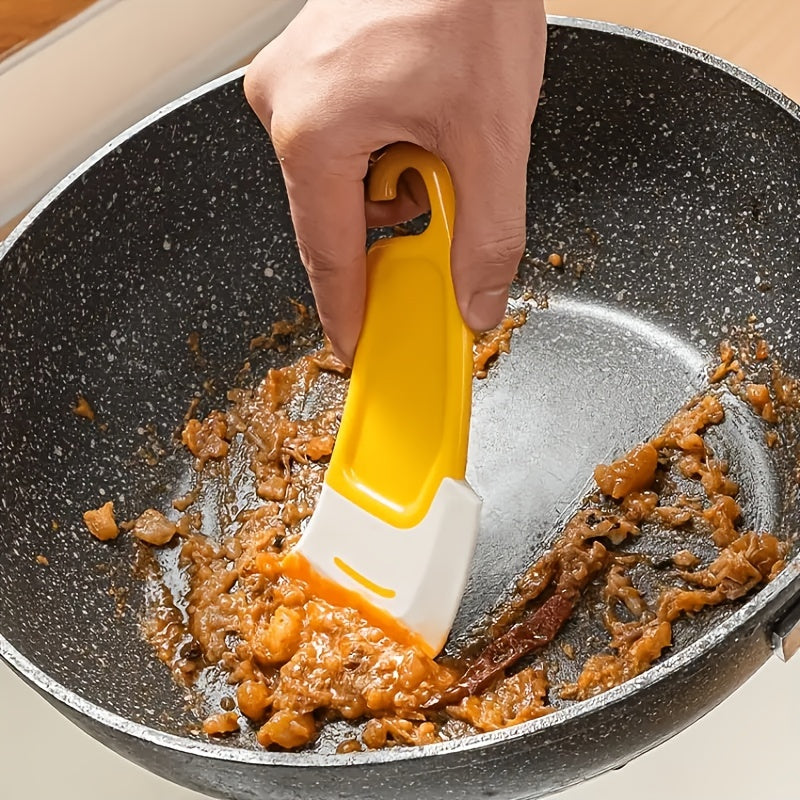 Køkkenskrapeværktøj med non-stick plastikblad
