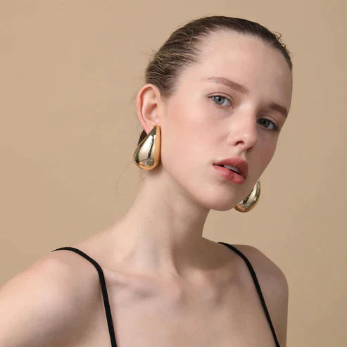 Kvinders elegante guld dråbeøreringe | Slankt poleret design