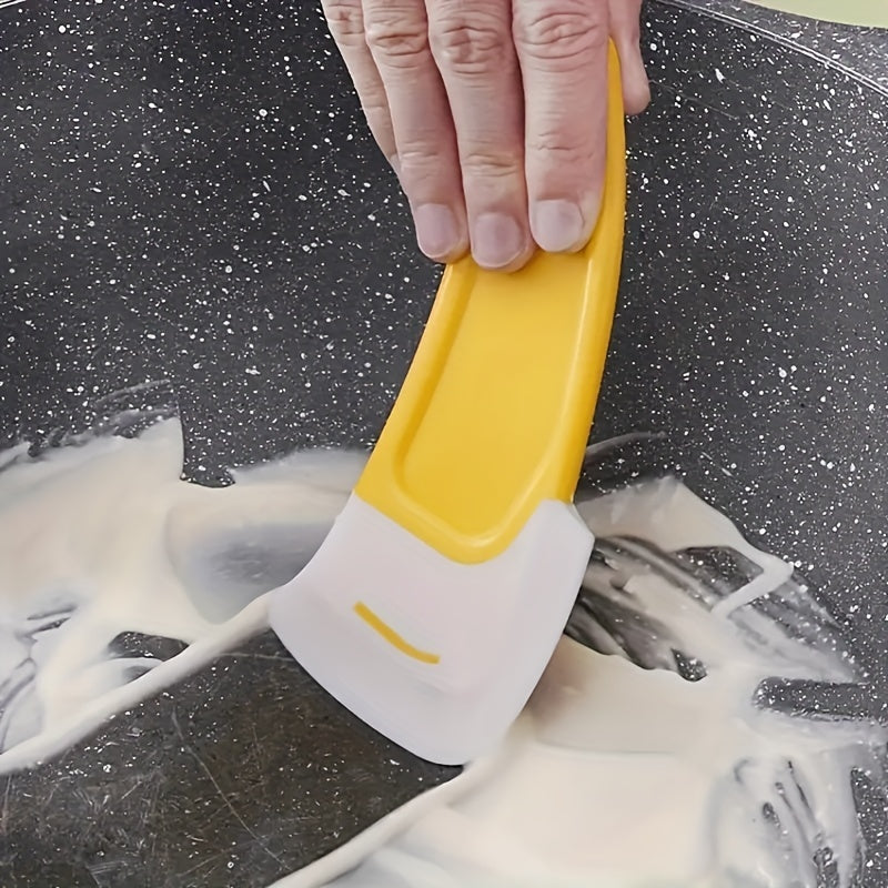Køkkenskrapeværktøj med non-stick plastikblad